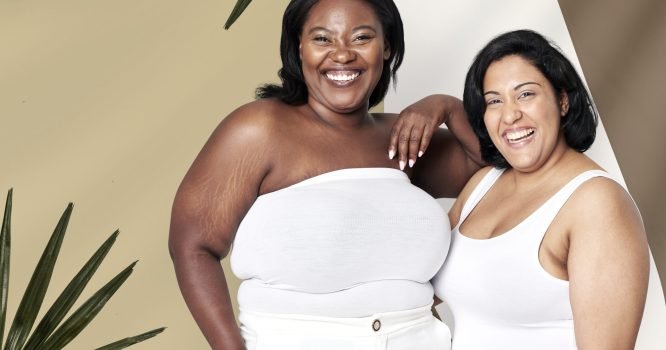 Attractive plus size model white top background
